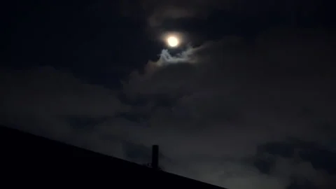 Bright Moon Shining Through Cloudy Night Sky Stock Footage 316991400
