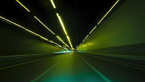 Bright Motion Hyperlapse of a Speedy Night Drive in a Big City, Windshield View Stock Footage 253471375