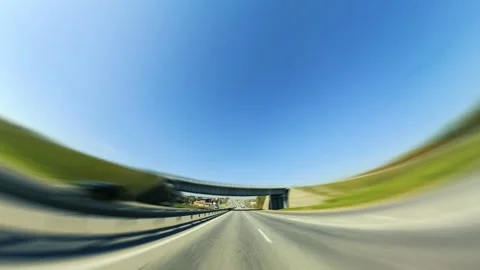Bright Motion Timelapse of a Speedy Day Drive Near a Big City, Streets and Trees Video stock 313715426