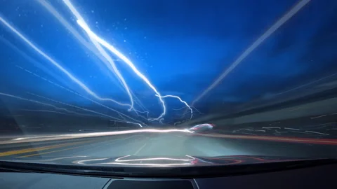 Bright motion timelapse of a speedy drive in night big city, view from car to Stock Footage 267817484