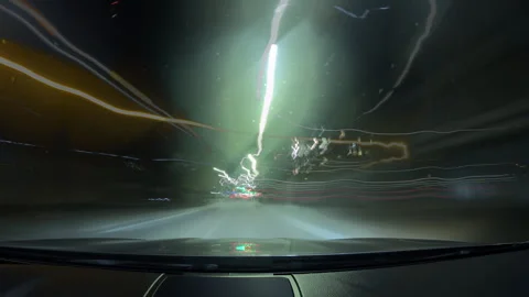 Bright motion timelapse of a speedy drive in night big city, view from car to Stock Footage 267817538