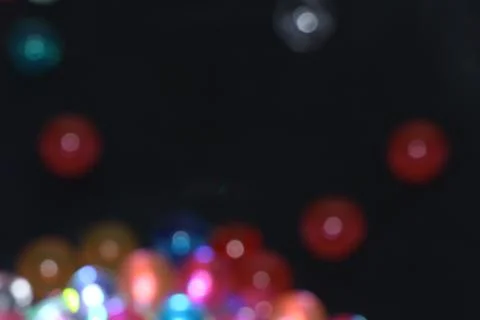 Bright motion water bubbles in light Stock Photos