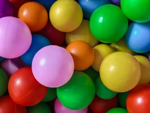 Bright multi-colored balls for the pool for childrens games.Toys for children Stock Photos