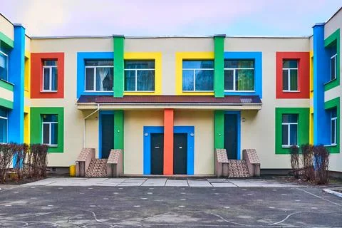 The bright multi-colored building of the kindergarten school Fotos de archivo