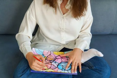 Bright multi-colored, completed neurographics drawing. Girl draws at home o.. Fotos Stock