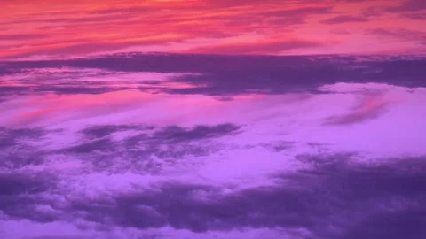 Bright Multi Colored Dawn Red Pink Lilac Orange Blue Sky Sun Light Clouds Airpla Stock Footage 328153264