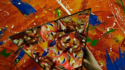 Bright multi-colored paint on the body of a young beautiful woman Stock Footage 124024727