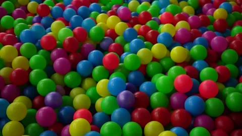 Bright multi-colored plastic balls. Large quantity. Close-up Stock Footage 220734524