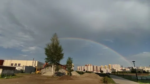 A bright, multi-colored rainbow arced across Stock Footage 337831846