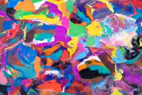 Bright multicolor plasticine abstract texture with kaleidoscopic swirls of sc Stock Photos