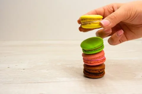 Bright multicolored macaroons vertically stacked Stock Photos