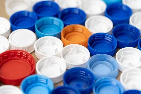 Bright multicolored plastic lids. the texture, the lids from different drin.. Stock Photos