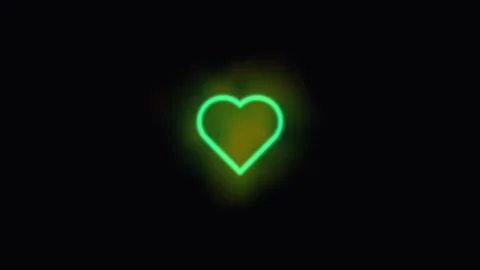 Bright neon heart shape glowing in a dark setting Stock Footage 338196778