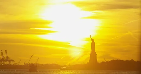 Bright New York Sunset With The Classic Statue Of Liberty Stock Footage 112161930