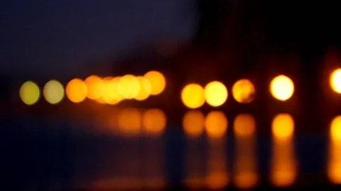 Bright night lights are reflected in sea water against the background of multi Stock Footage 94589884