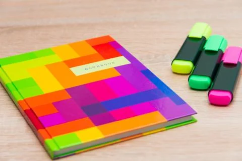 Bright notepad with markers Stock Photos