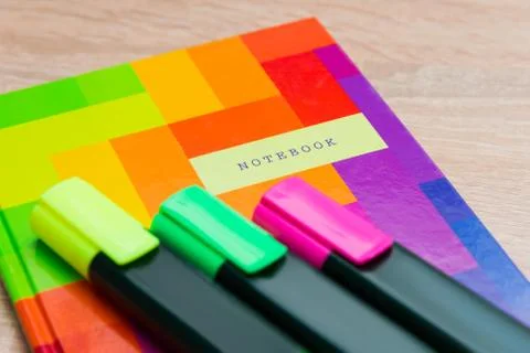 Bright notepad with markers Stock Photos