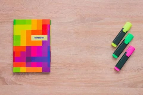 Bright notepad with markers Stock Photos