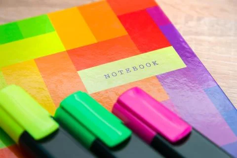 Bright notepad with markers Stock Photos
