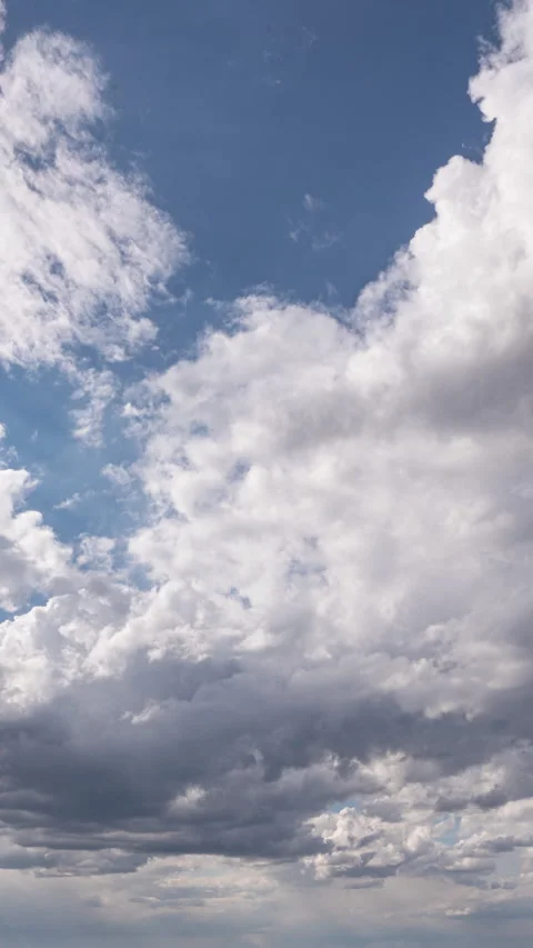 Bright open sky with drifting clouds symbolizing freedom, openness, and Stock Footage 335714021