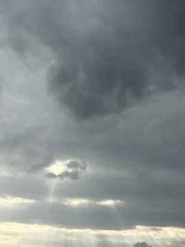 Bright Opening in Layered Storm Clouds Stock Photos
