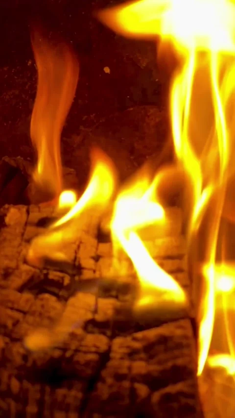 Bright orange and yellow flames burning wood in fireplace Stock Footage 331976285
