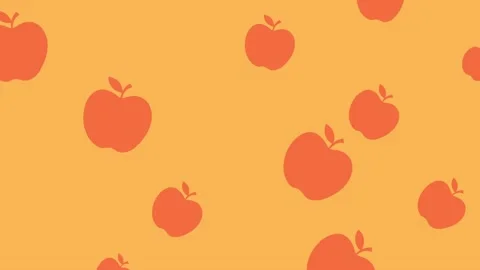 Bright orange apples going across light orange background Stock Footage 138546049