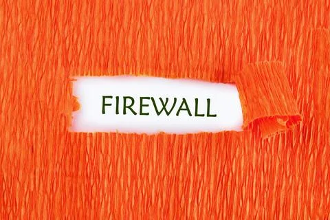 Bright orange backdrop features a paper tearing effect with the word firewall Foto stock