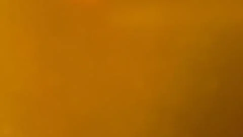 Bright orange background with a solid, uniform tone Stock Photos