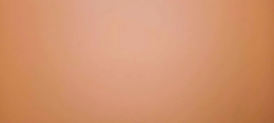 Bright orange background with a solid, uniform tone 스톡 사진