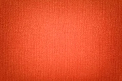 Bright orange background from a textile material with wicker pattern, closeup Stock-Illustration