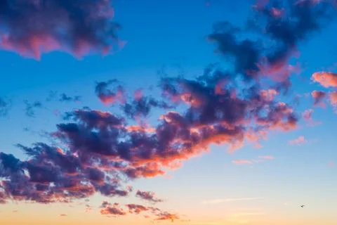 Bright orange clouds in the evening sky Stock Photos