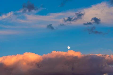Bright orange clouds in the evening sky Stock Photos