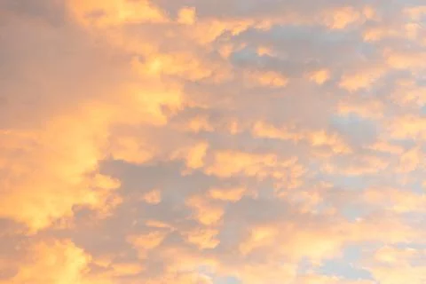 Bright orange clouds in the sky during sunrise. Beauty of nature concept. Nature Stock Photos