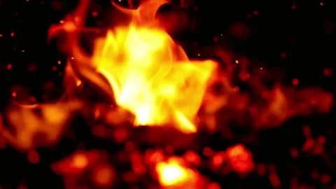 Bright orange flames dance and flicker against a dark, smoky background Stock Footage 312304037