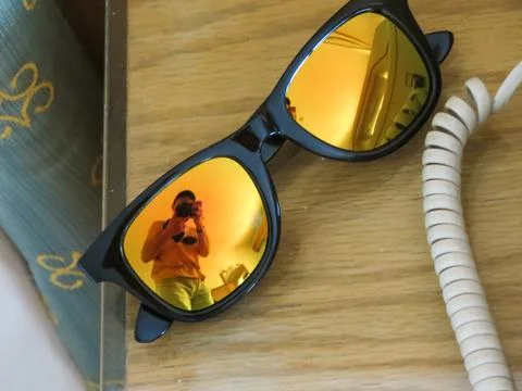 Bright orange glasses in black frames Stock-Fotos