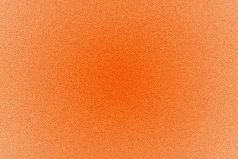 Bright orange grainy gradient background featuring fine noise texture and s.. 스톡 사진