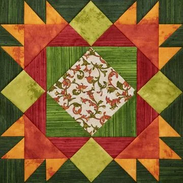 Bright orange-green geometric patchwork block from pieces of fabrics Stock Photos