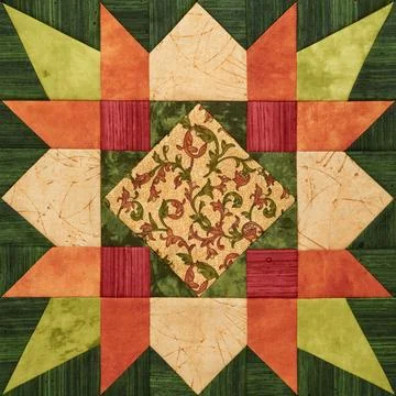Bright orange-green geometric patchwork block from pieces of fabrics Stock Photos
