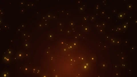 Bright orange particles create a sparkling effect in dark space Stock Footage 336994635