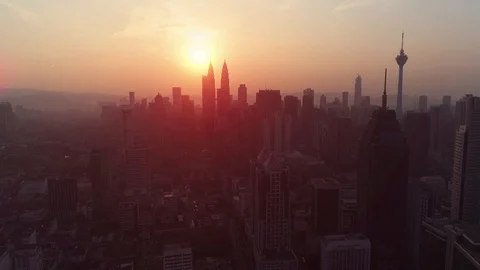 Bright orange-red sun rises over the beautiful landscape of city, Kuala Lumpur Stock Footage 86209763