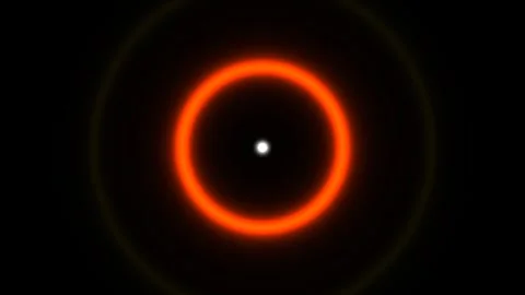 Bright orange ring with white center on black background Vídeo Stock 338012190