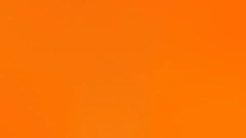 Bright orange seamless loop background with smooth gradient. 4K vibrant color Vídeo Stock 309855621