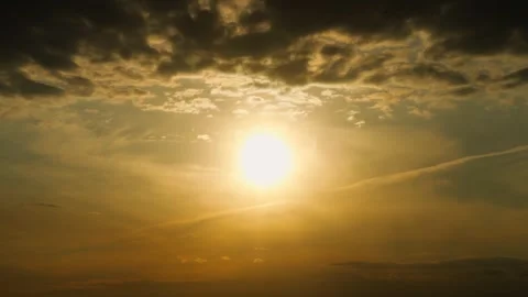 Bright orange sun and clouds. Spectacular sunset in the sky. Sunlight. Stock Footage 308852537