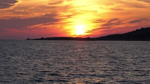 Bright Orange Sunset Over Dark Waters Stock Footage 265504846