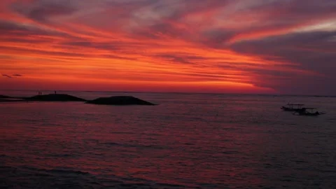 A bright orange sunset over the ocean Stock Footage 288325570