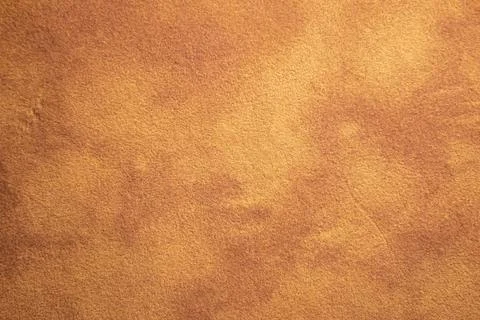 Bright orange texture or background of smooth fabric material Stock Photos