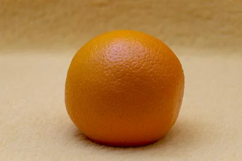 Bright orange on yellow background Stock Photos