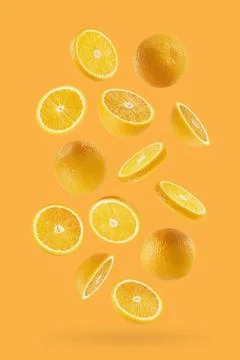 Bright oranges as flow fly or fall as art composition. Whole, half, round sli Stock Photos