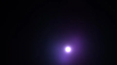 Bright orb of light glowing in a dark space with purple hue Stock-Footage 338289221